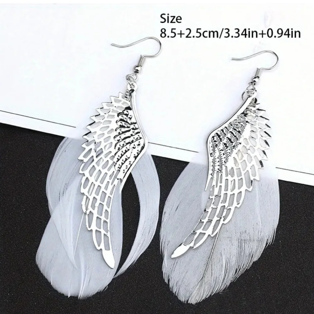 Hollow Angel's Wing Design With White Feather Dangle‎ Earrings 2/$15 3/$20